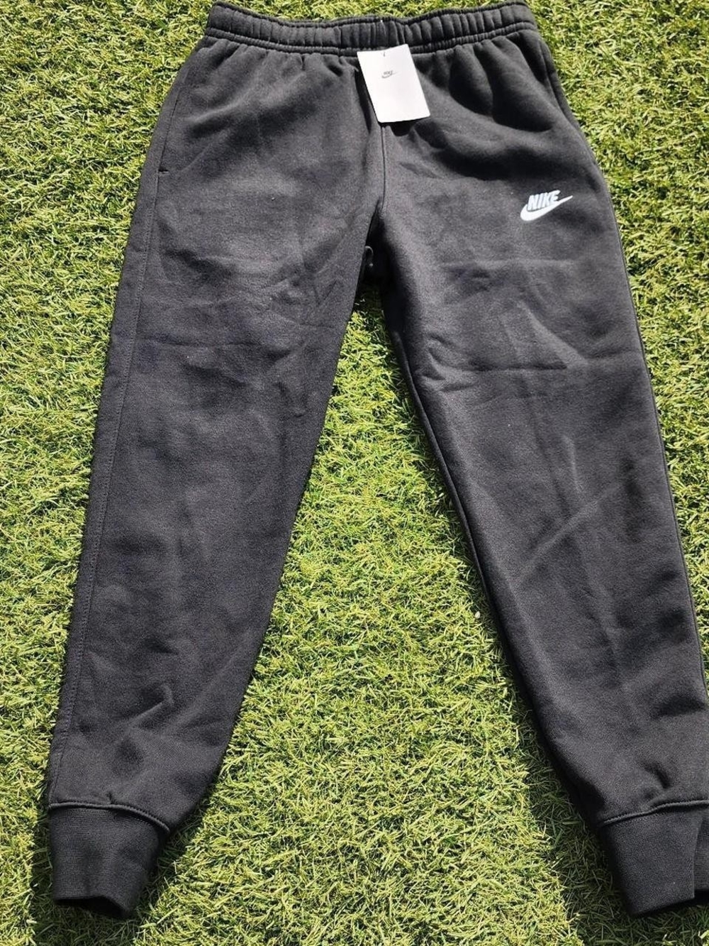 Nike Kids Black Jogger Sweatpants with White Swoosh